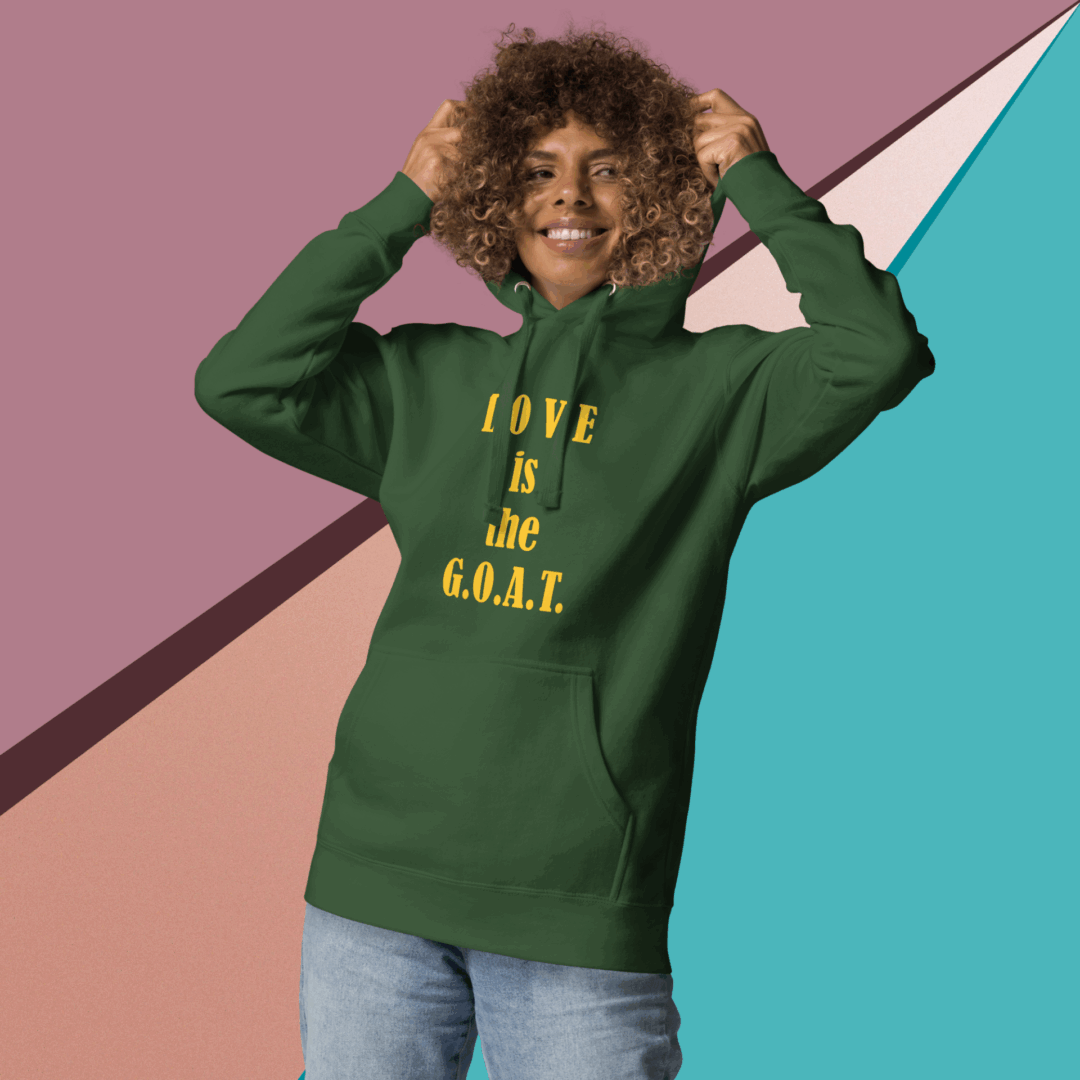 Woman wearing a green hoodie with text on a colorful background.