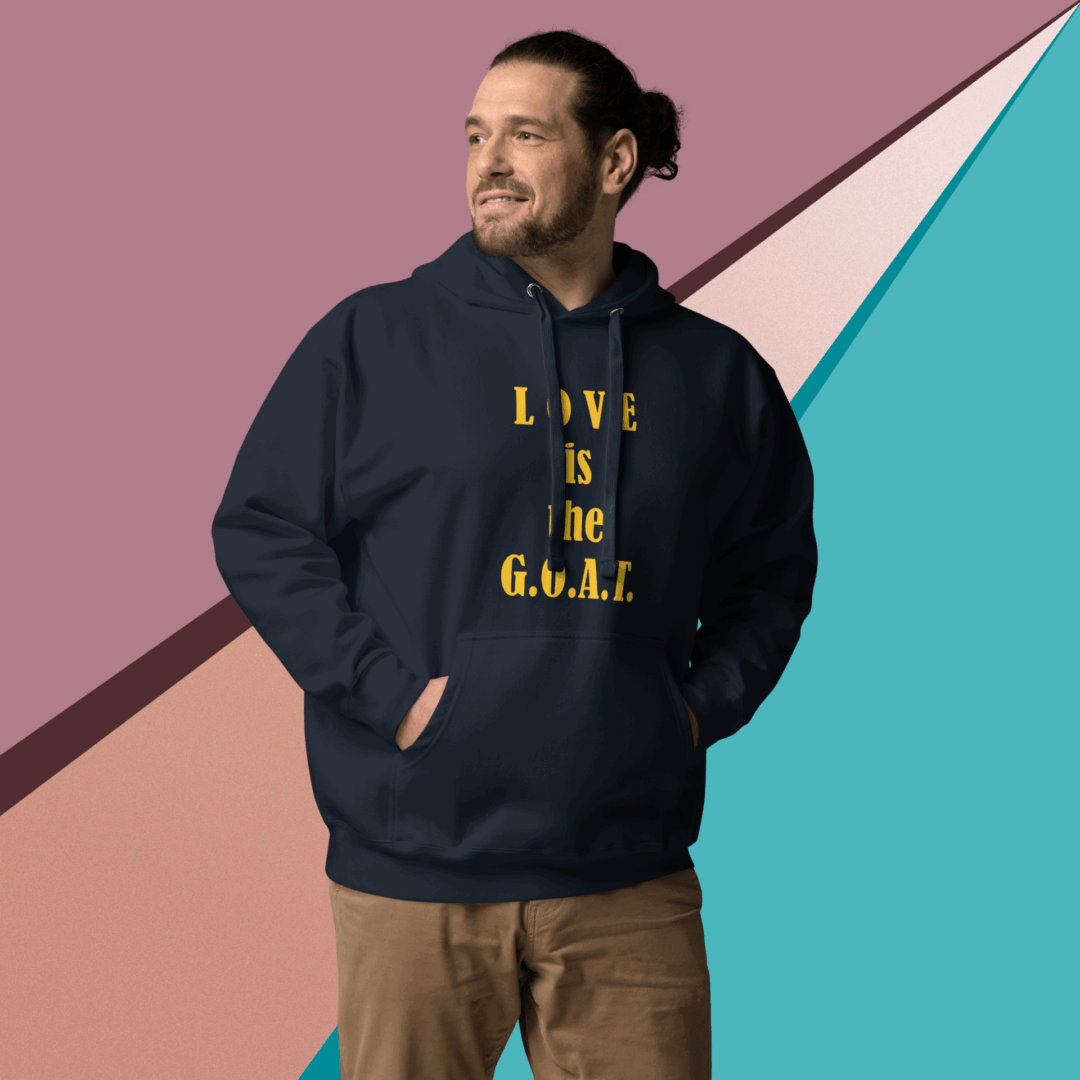 Man wearing a navy hoodie with a motivational quote.