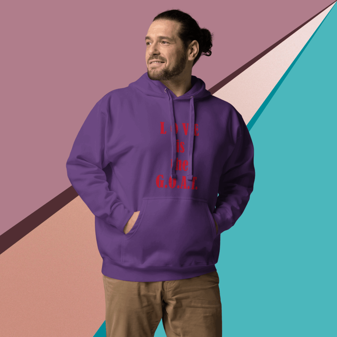 Man smiling wearing a purple hoodie with red text.