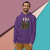 Man wearing a purple hoodie with a graphic print, smiling.