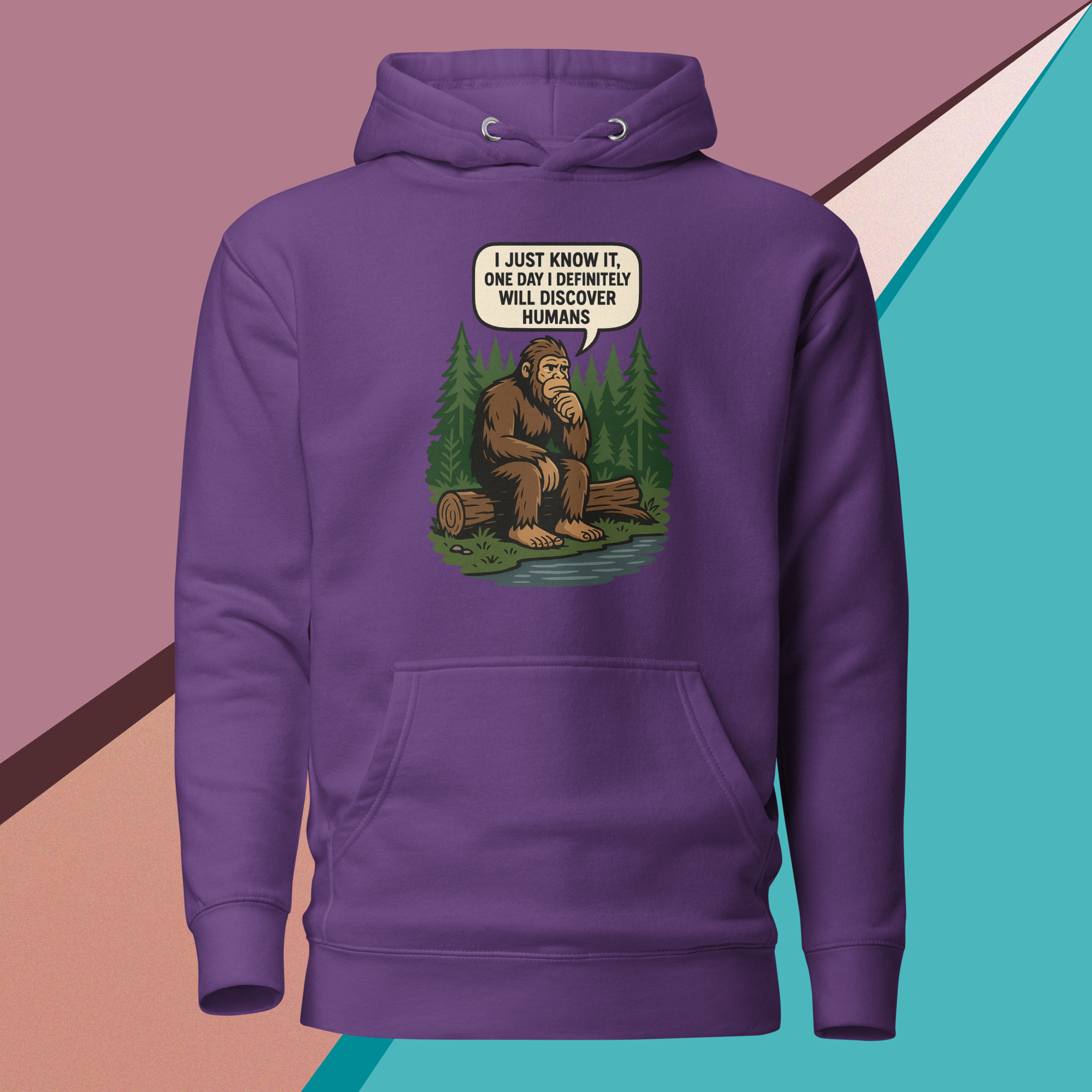 Purple hoodie with a thoughtful Bigfoot saying he'll discover humans one day.