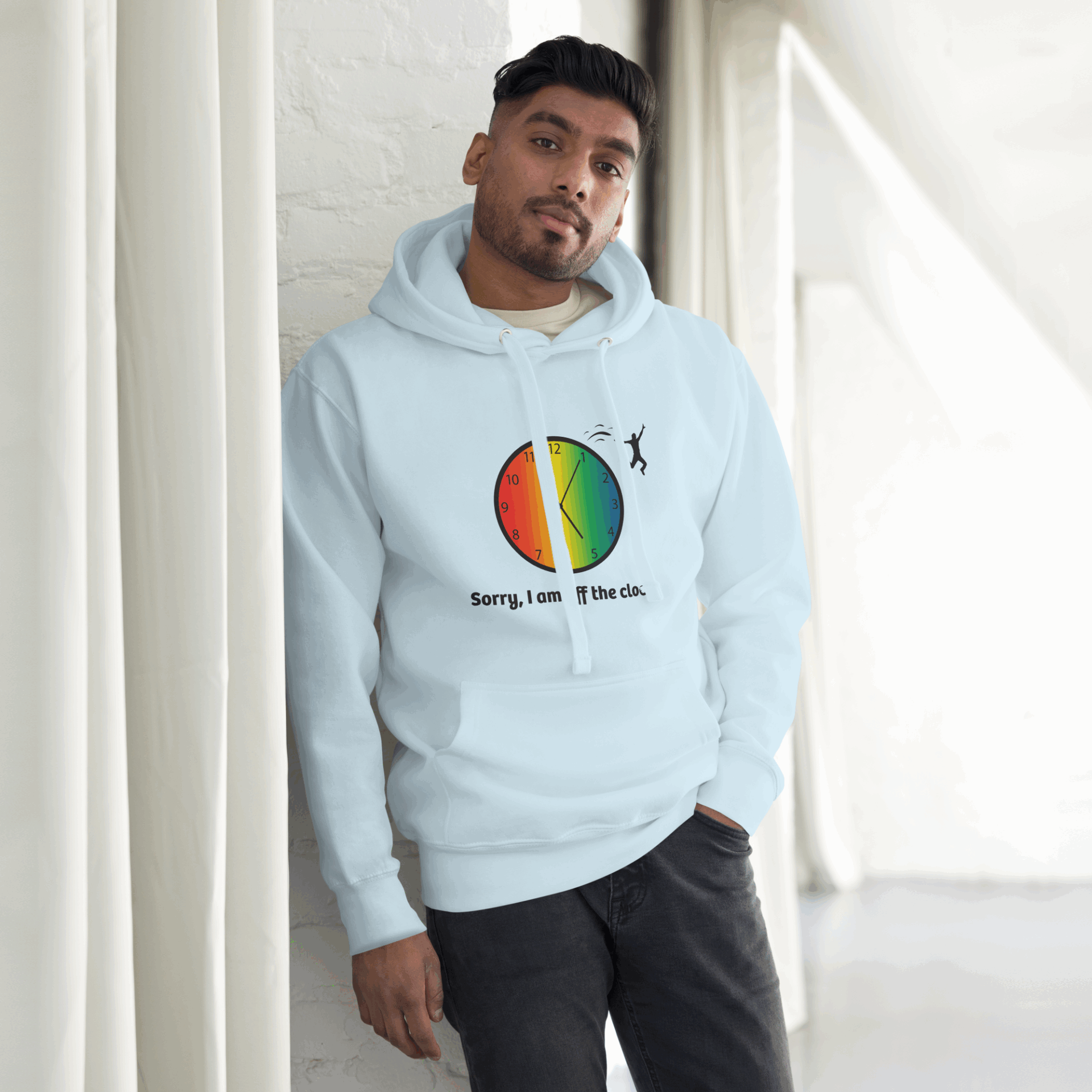 cotton-heritage-m2580-i-unisex-premium-pullover-hoodie-sky-blue-front-68e324bfcccec Man in light blue hoodie with a colorful apple design.