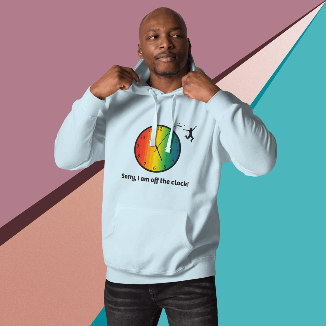 cotton-heritage-m2580-i-unisex-premium-pullover-hoodie-sky-blue-front-68e32646874f5 Man wearing a light blue hoodie with a colorful graphic and text.