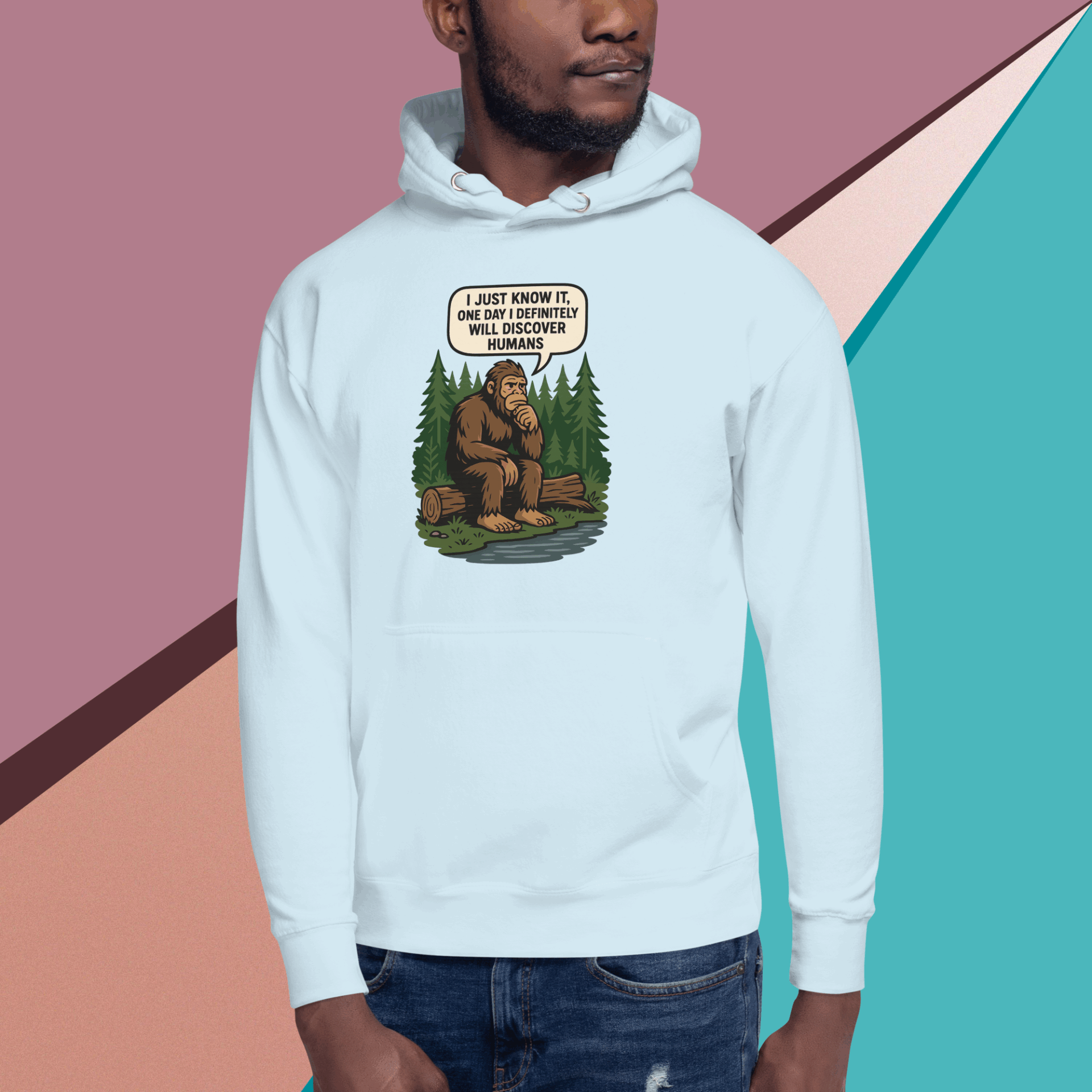 Man wearing a white hoodie with a humorous bear graphic design.