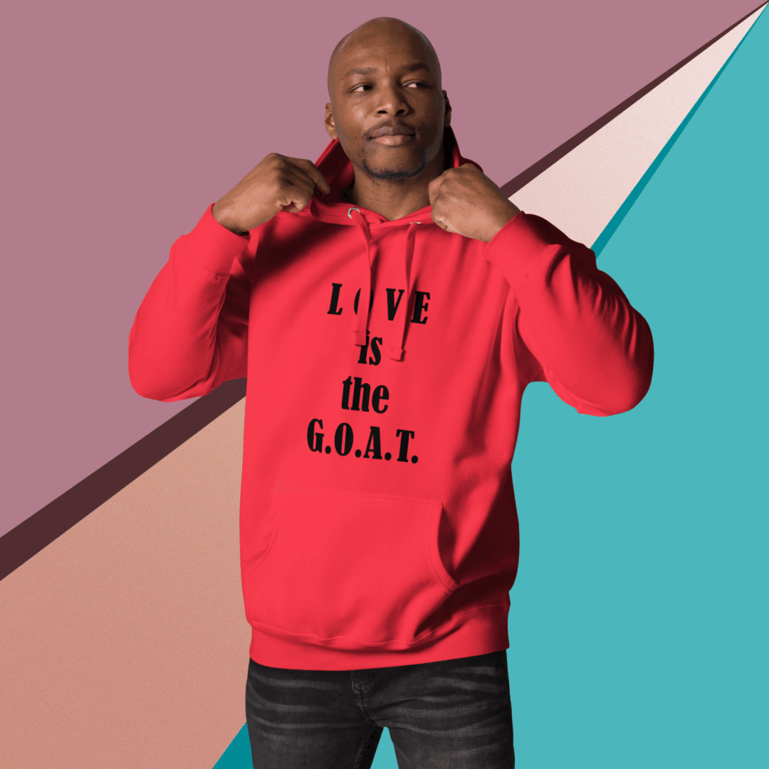 Man in red hoodie with 'LOVE is the G.O.A.T.' text.