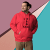 Man in red hoodie with text, standing against colorful geometric background.