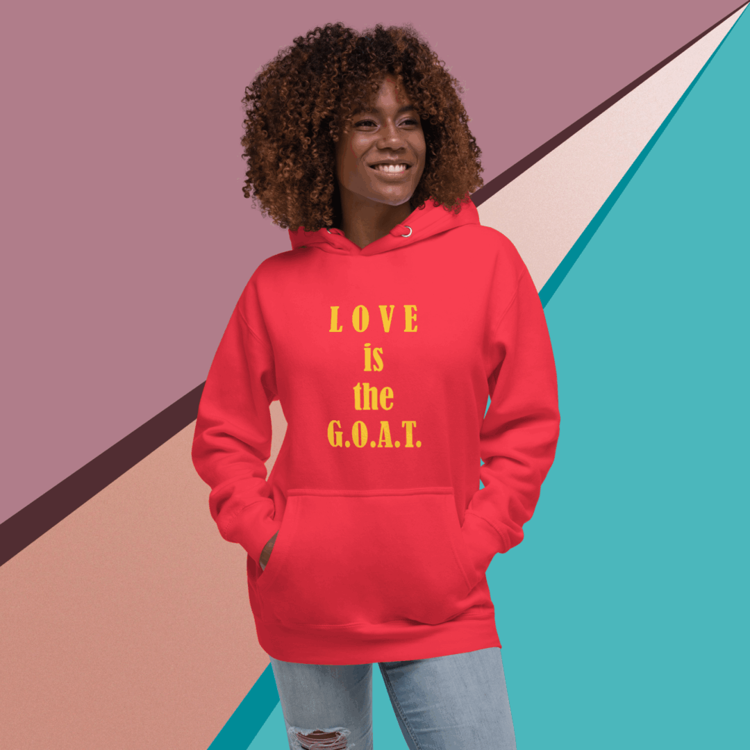 Smiling woman wearing a red hoodie with 'LOVE is the S.O.U.L' text.