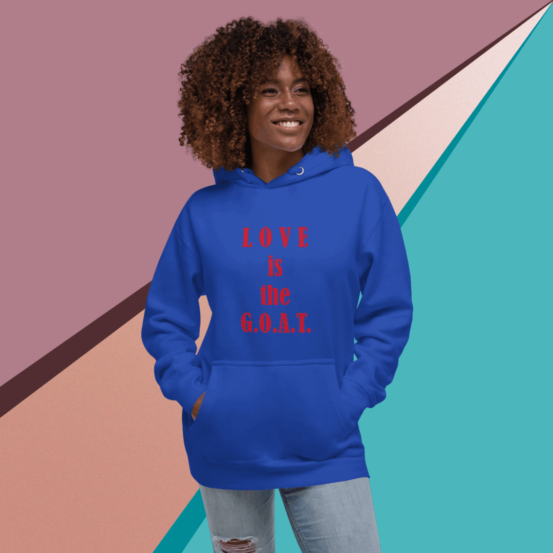 Smiling woman wearing a blue hoodie with red text.