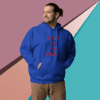 Man in blue hoodie with red text posing against a colorful geometric background.