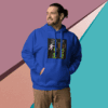 Man in blue hoodie with graphic print stands against colorful geometric background.