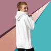 cotton-heritage-m2580-i-unisex-premium-pullover-hoodie-white-back-68f046de09a5c A woman wearing a white hoodie, smiling and looking over her shoulder.