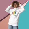 cotton-heritage-m2580-i-unisex-premium-pullover-hoodie-white-front-68e325432f692 Smiling person wearing a white hoodie with a colorful logo against a geometric background.