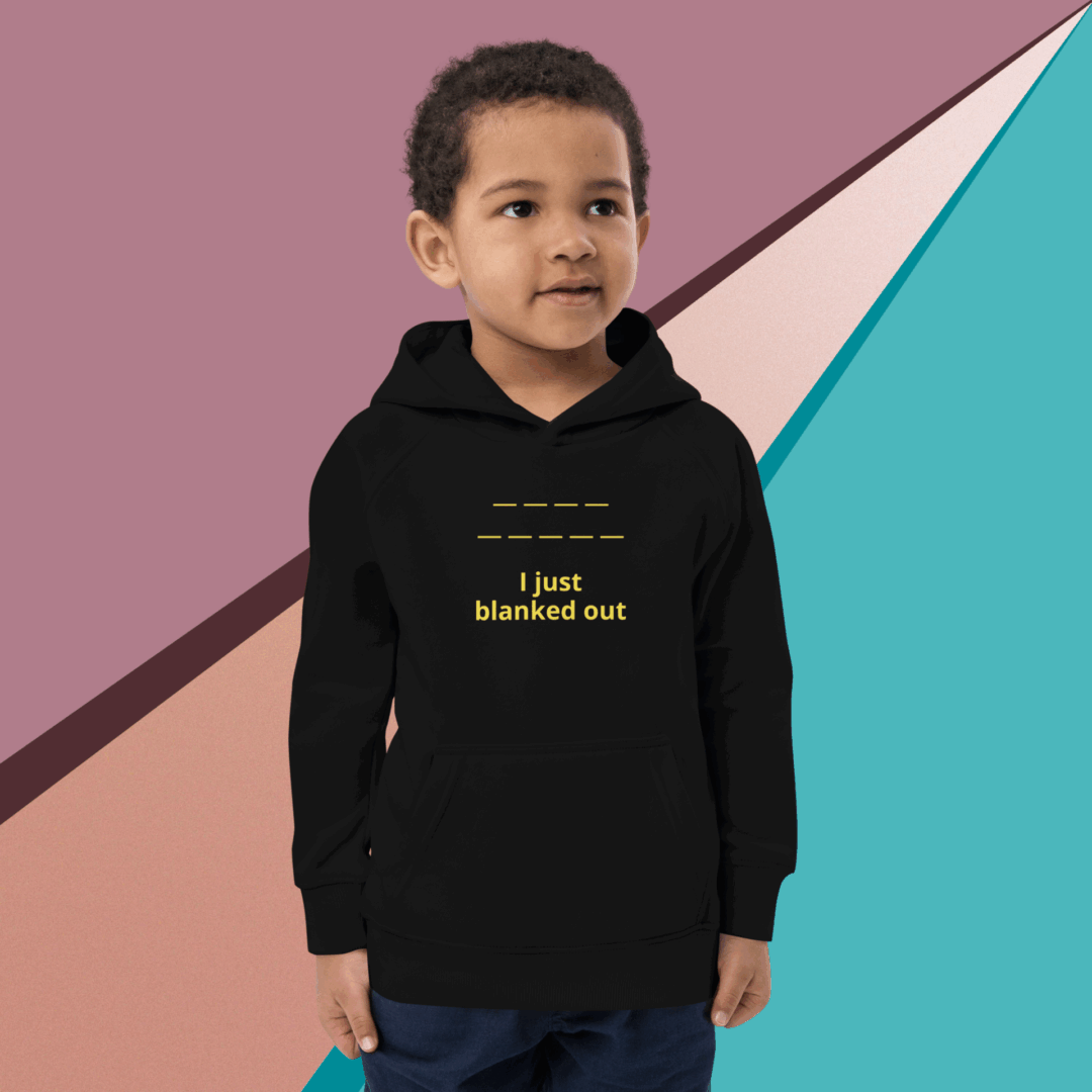 Young boy wearing a black hoodie with a motivational quote.