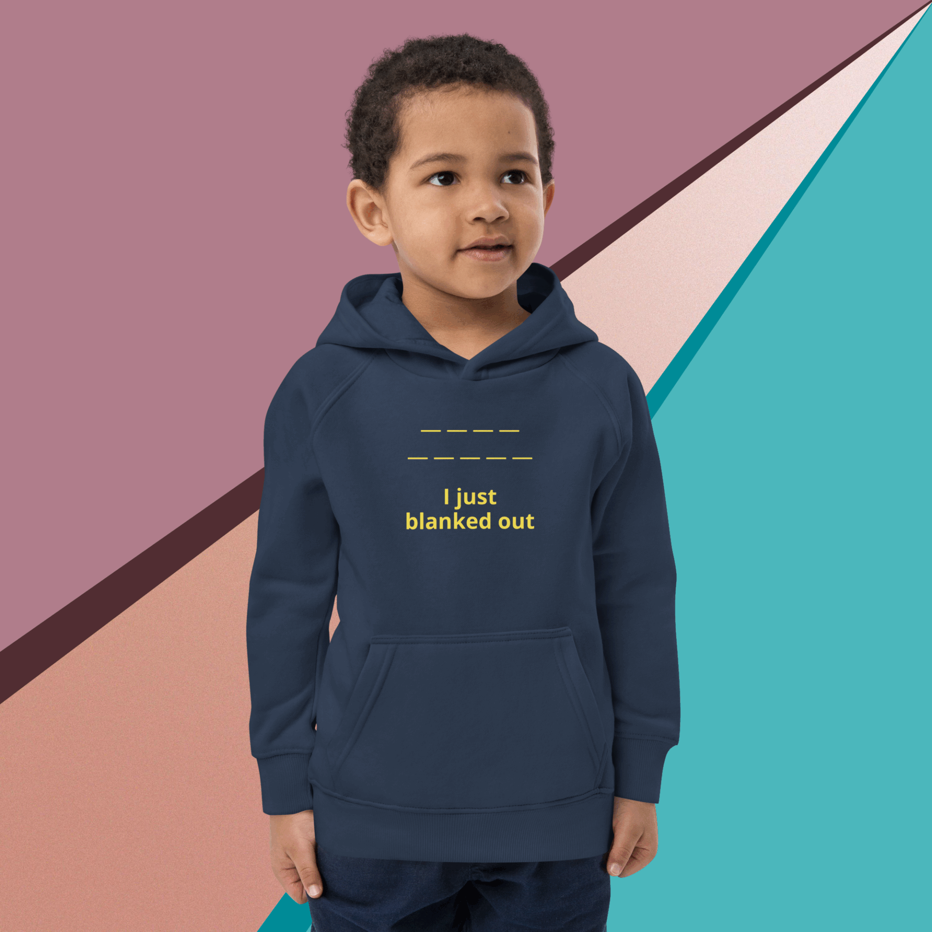 Young boy wearing a navy blue hoodie with a colorful geometric background.