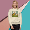 Woman wearing a cream sweater with a colorful dog-themed graphic design.