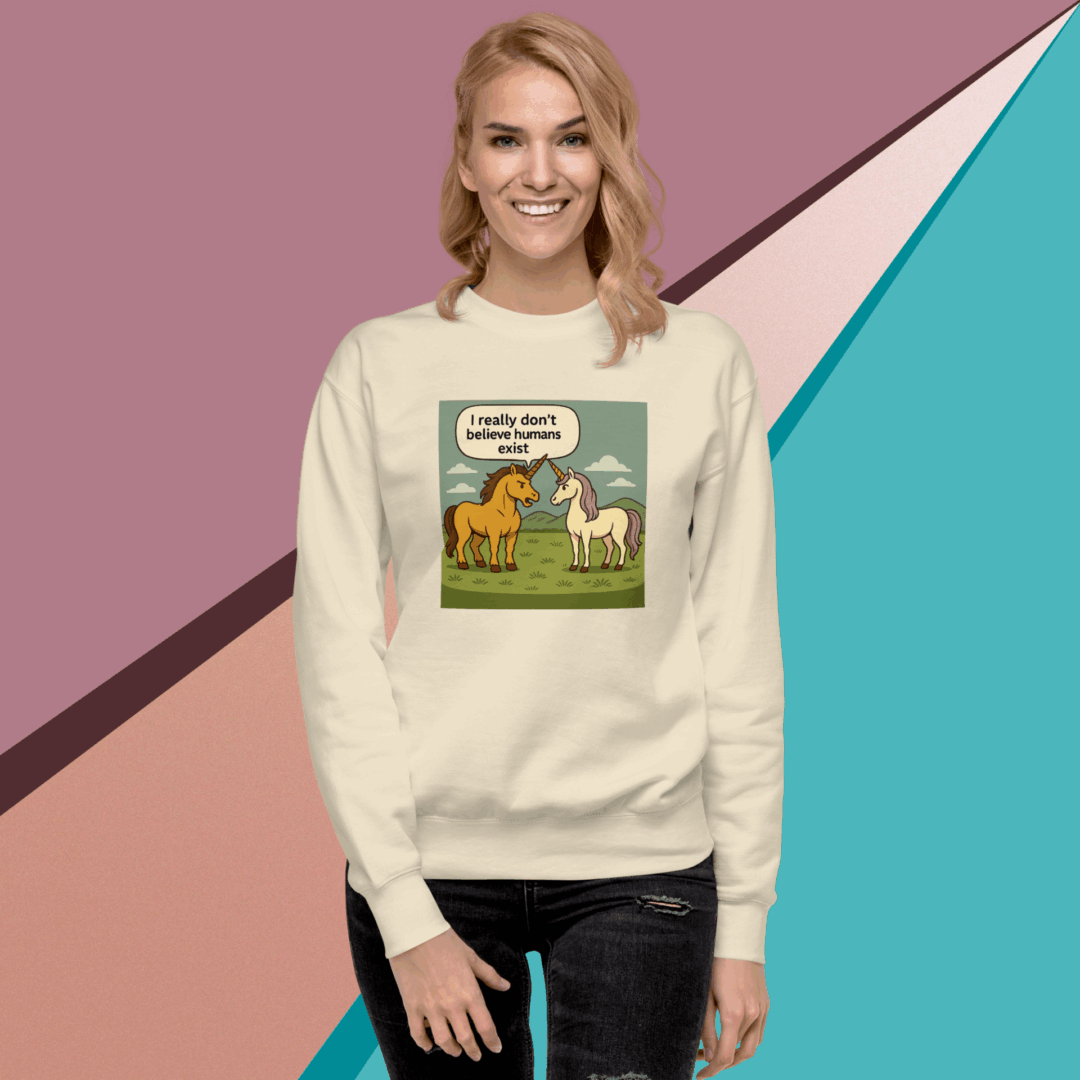 Woman wearing a cream sweater with a colorful dog-themed graphic design.