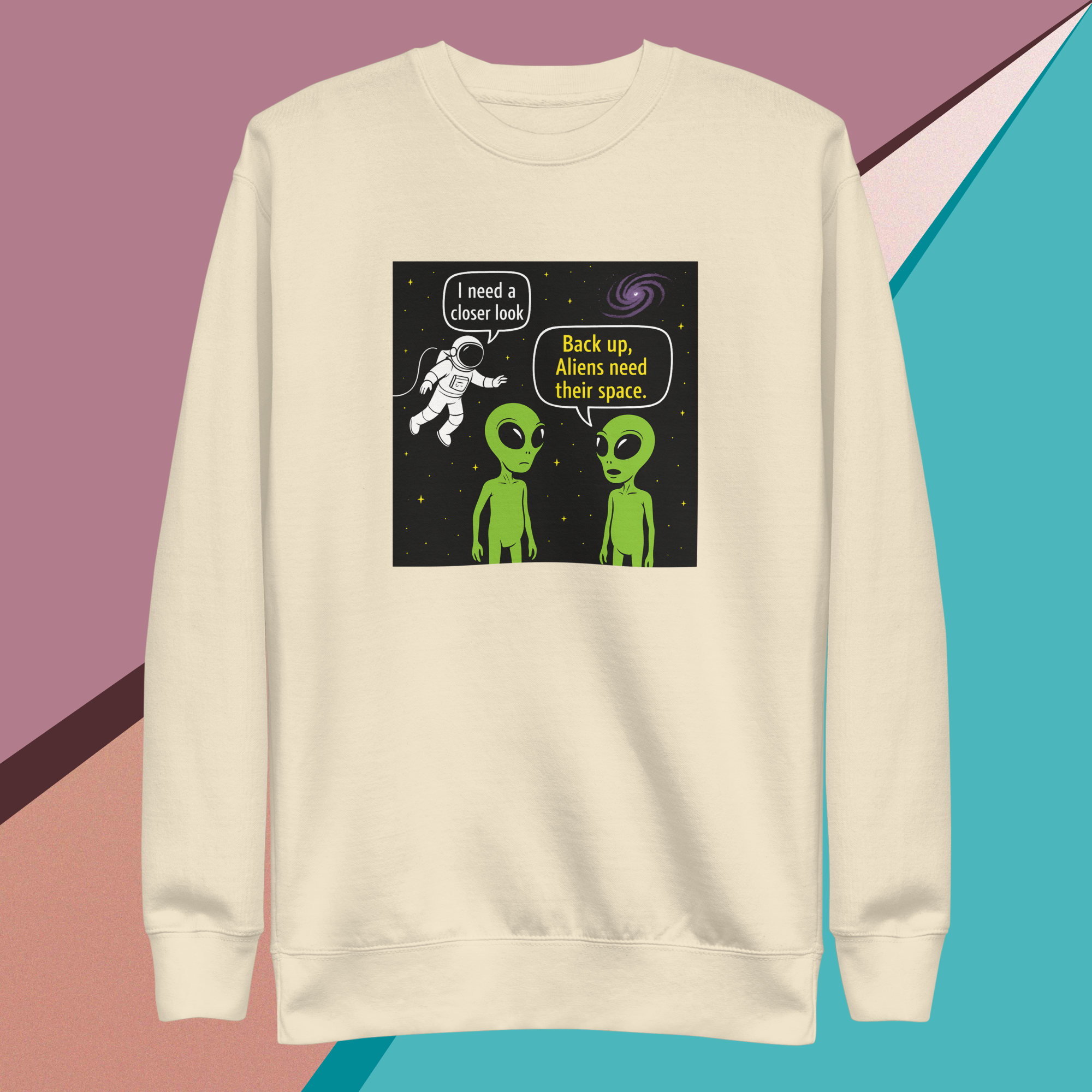 Sweatshirt with aliens telling astronaut to give them space in a comic style.