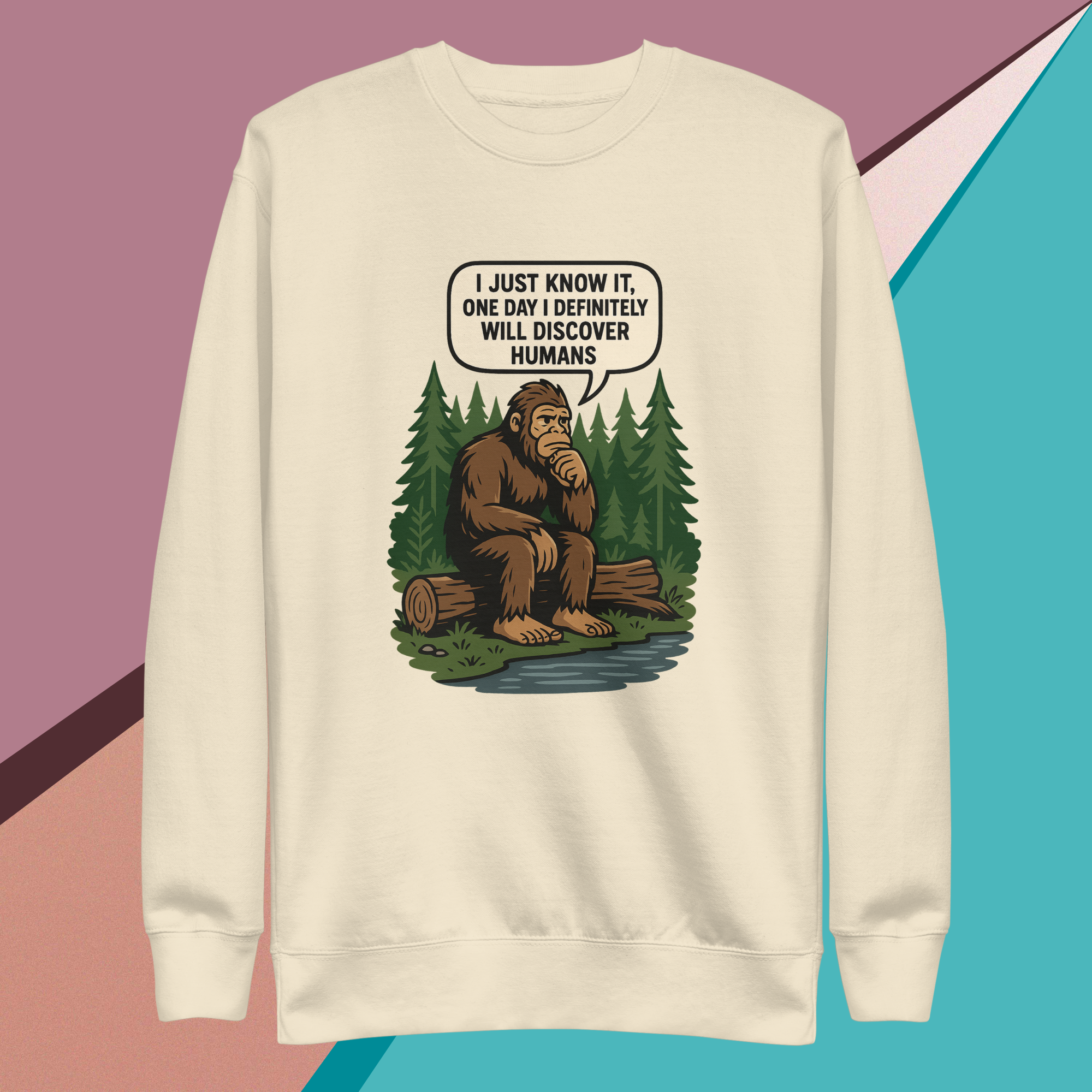 Sweatshirt featuring a thoughtful Bigfoot saying he'll discover humans one day.