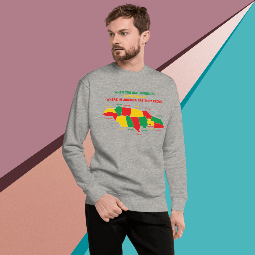 Man wearing a gray sweatshirt with a colorful bear graphic and text.