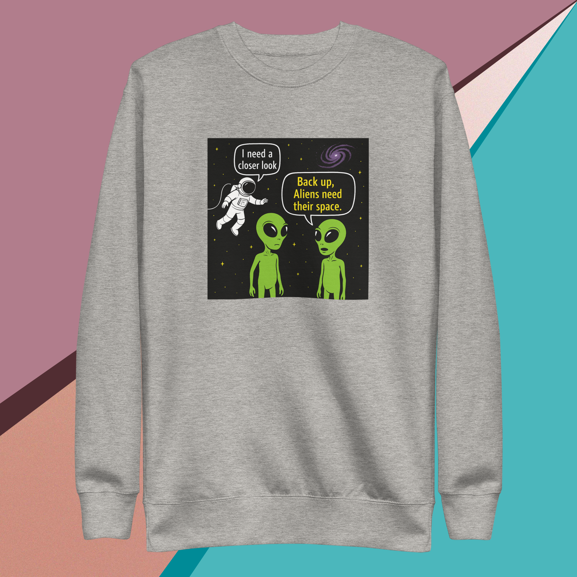Gray sweatshirt with cartoon aliens and astronaut saying aliens need their space.