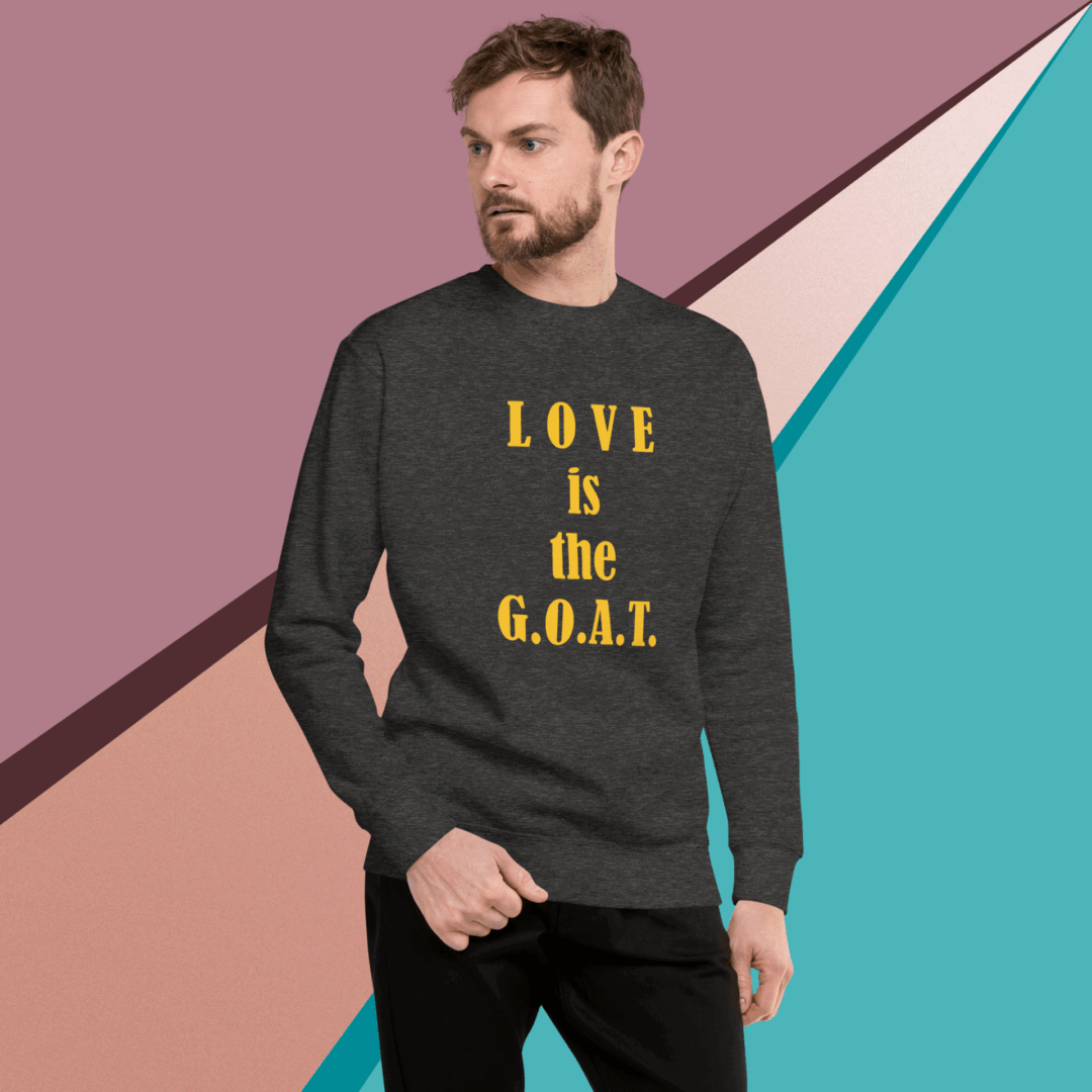 unisex-premium-sweatshirt-charcoal-heather-front-68f061351d23b Man wearing a black sweatshirt with a motivational quote on a colorful geometric background.