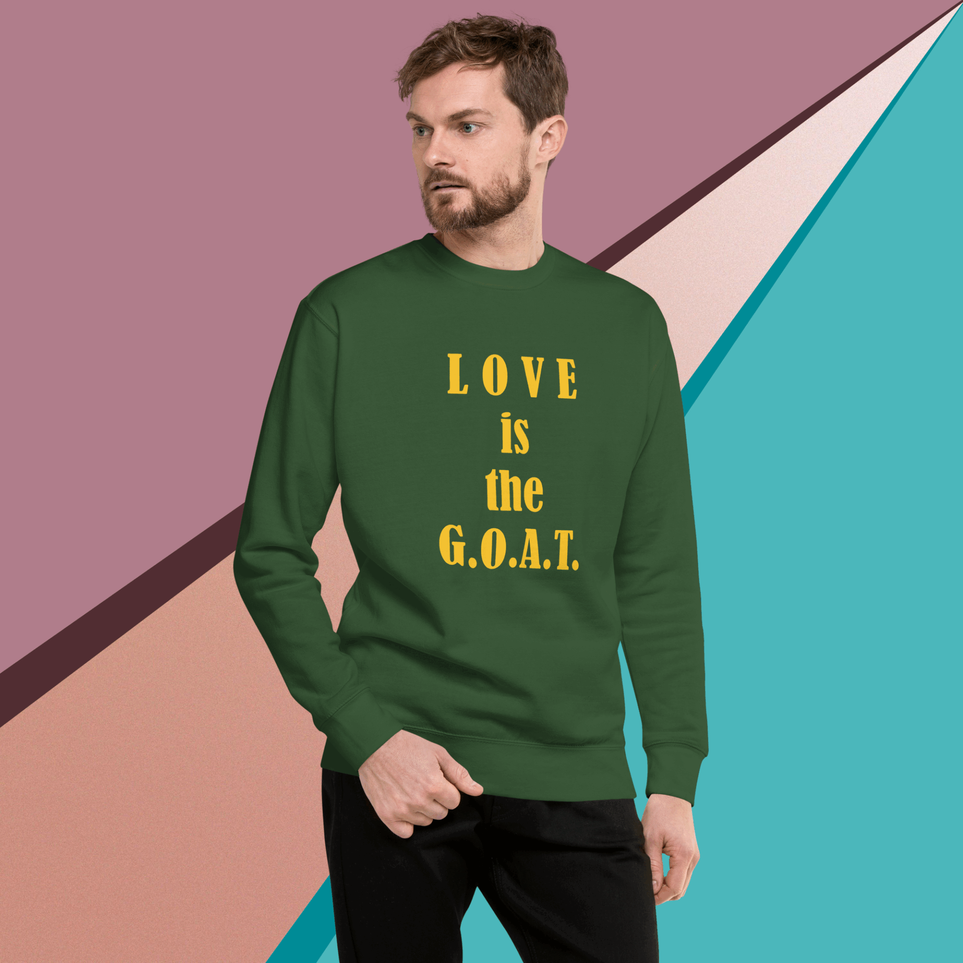 unisex-premium-sweatshirt-forest-green-front-68f0613522f4f Man wearing green sweatshirt with "LOVE is the G.O.A.T." text.