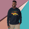 Smiling man wearing a colorful state-shaped graphic sweatshirt.