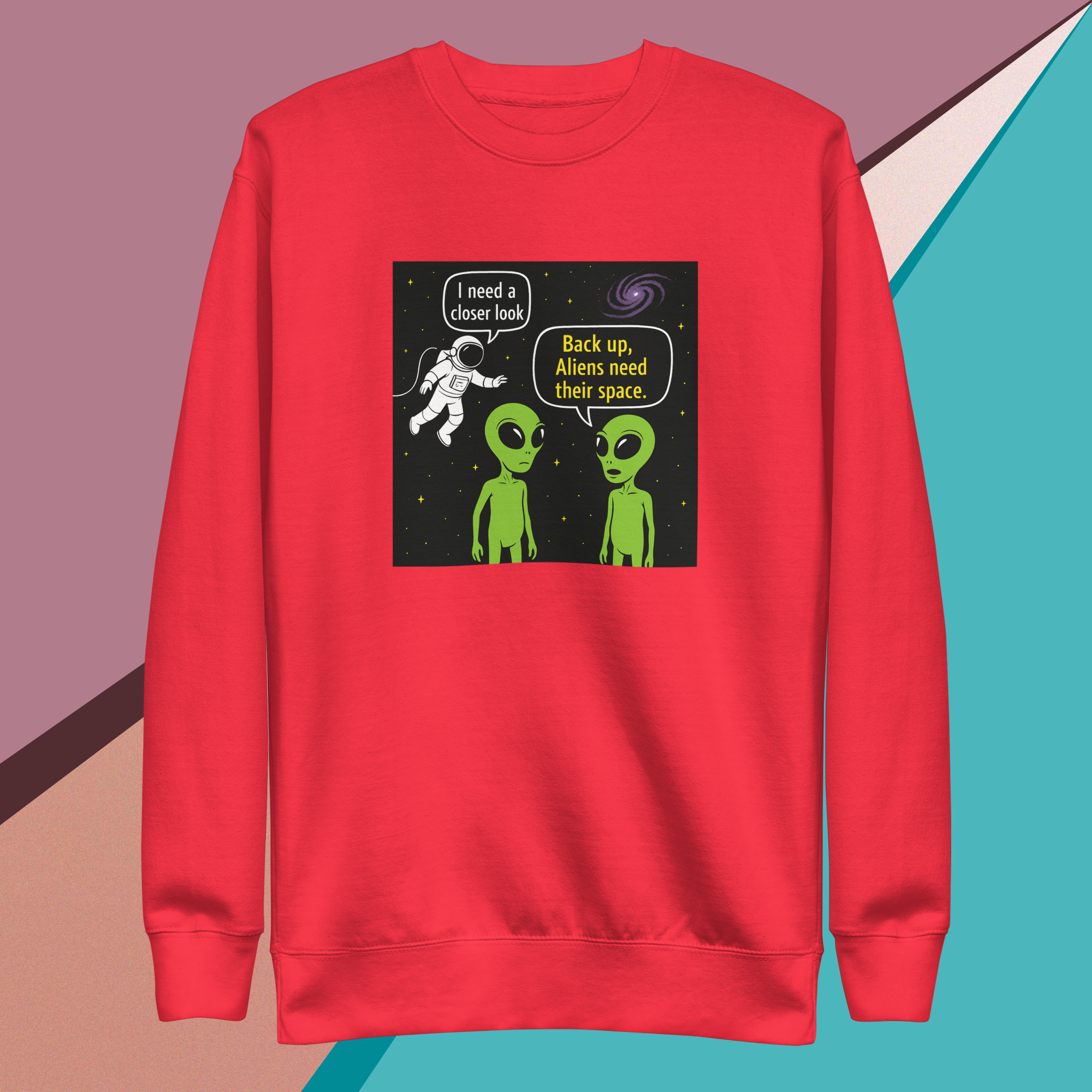 Red sweatshirt with a humorous alien and astronaut comic graphic.