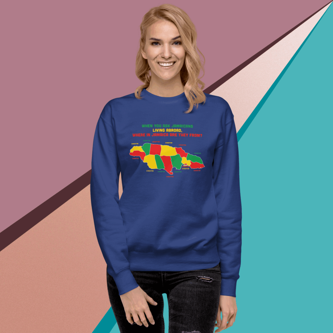 Woman wearing a colorful turtle graphic sweatshirt against a geometric background.