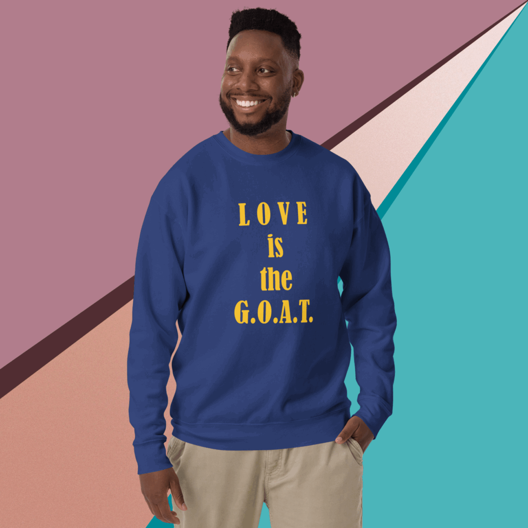 unisex-premium-sweatshirt-team-royal-front-68f060dc4c351 Man smiling, wearing a blue sweatshirt with yellow text.