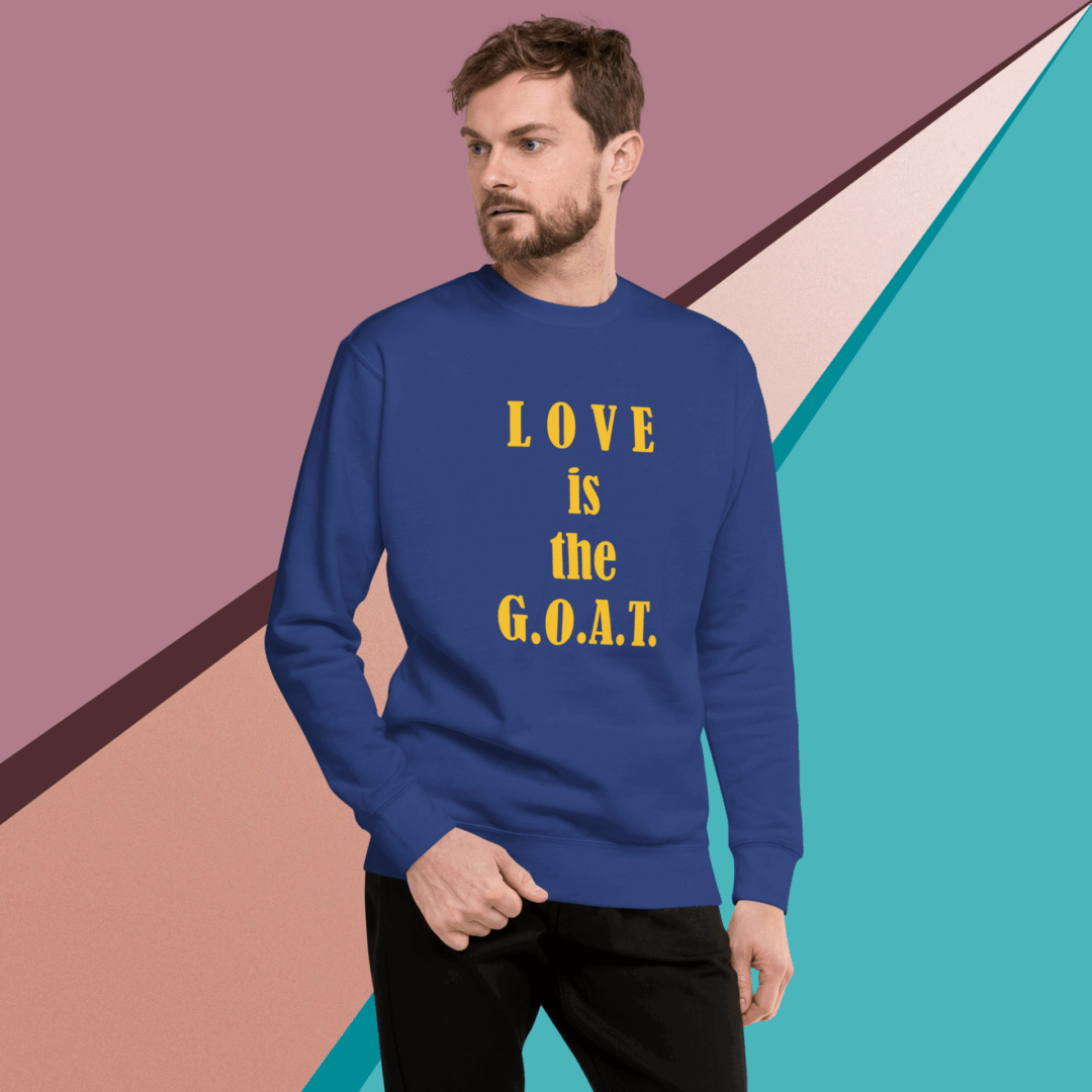 unisex-premium-sweatshirt-team-royal-front-68f0613520db4 Man in a blue sweatshirt with yellow text stands against a colorful geometric background.