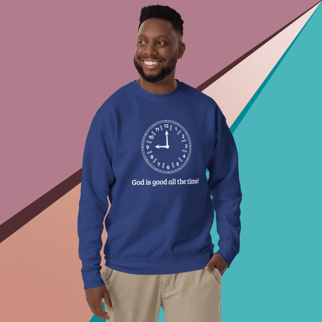 Smiling man wearing a blue sweatshirt with a positive message.