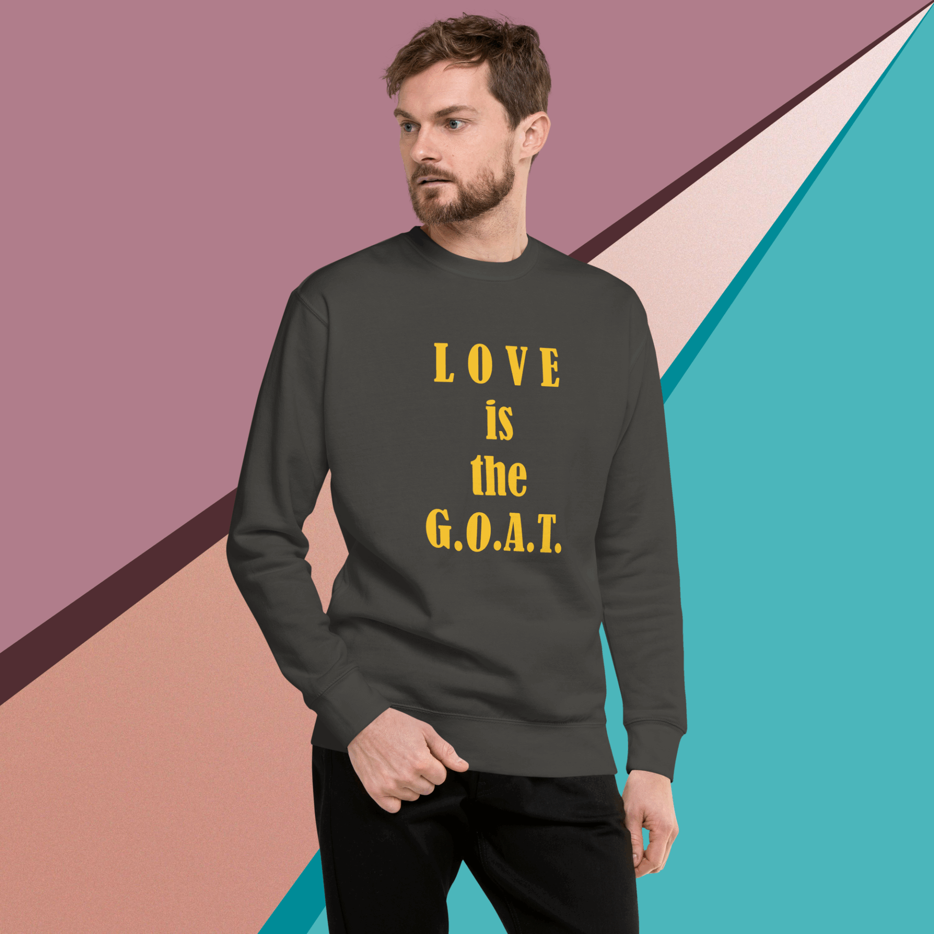 unisex-premium-sweatshirt-vintage-black-front-68f0613524a1e Man wearing a dark sweatshirt with yellow text on a colorful geometric background.