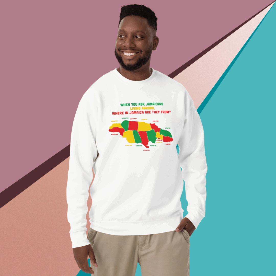 Man smiling wearing a white sweatshirt with a colorful African map design.