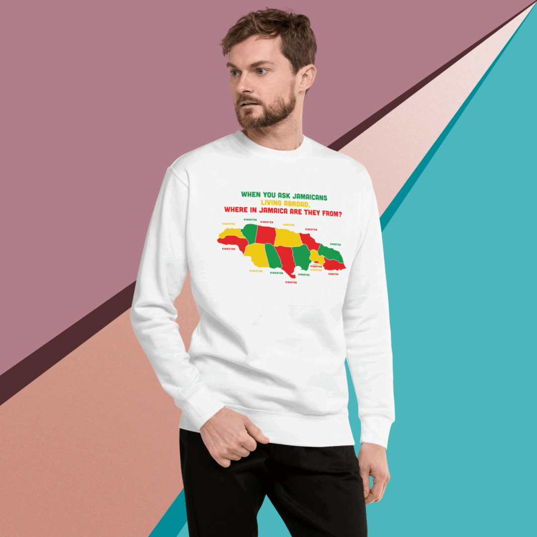 Man wearing a white sweatshirt with a colorful bear design.