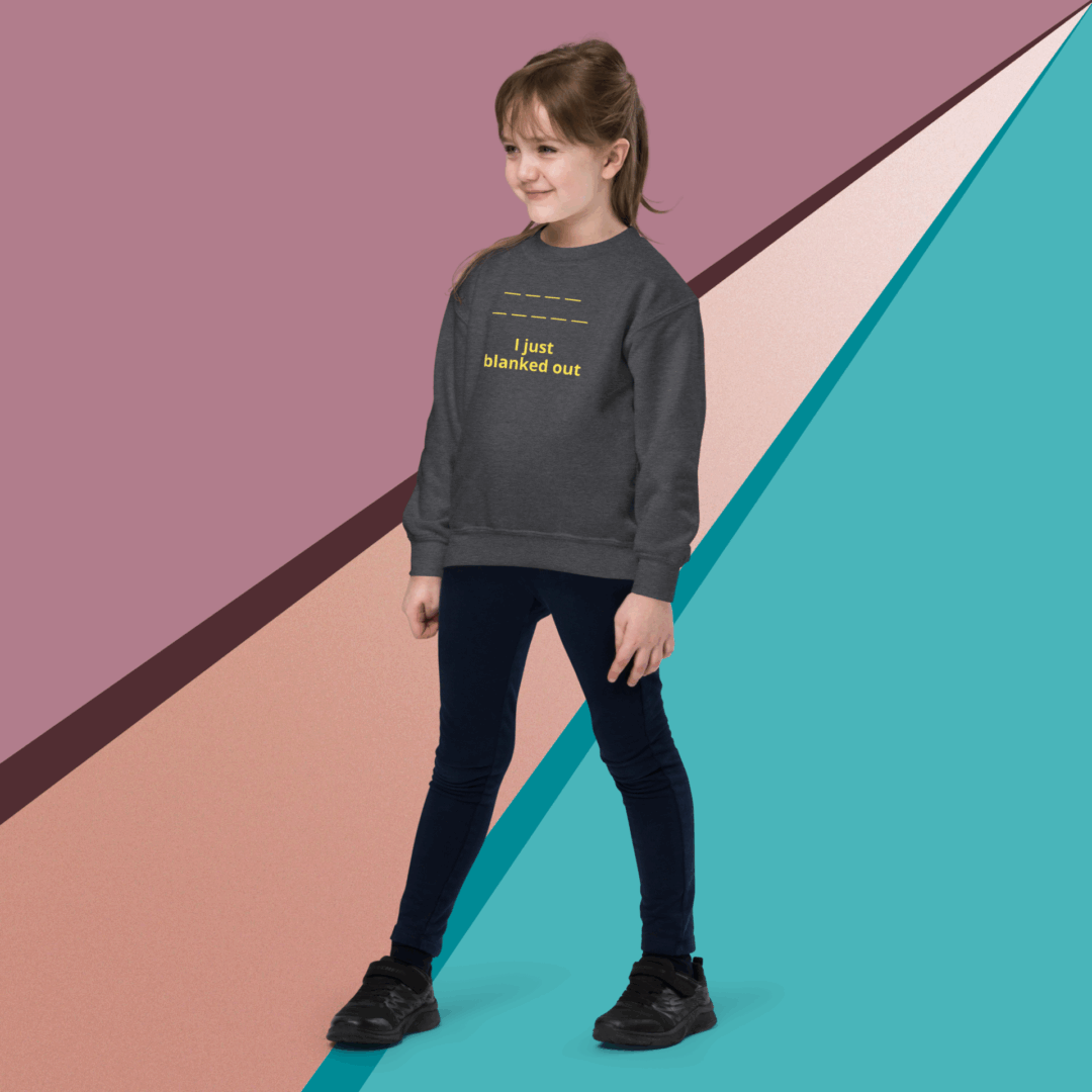 Young girl posing confidently in casual outfit against a geometric background.