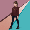 Child wearing a maroon sweater and black pants standing against a colorful geometric background.