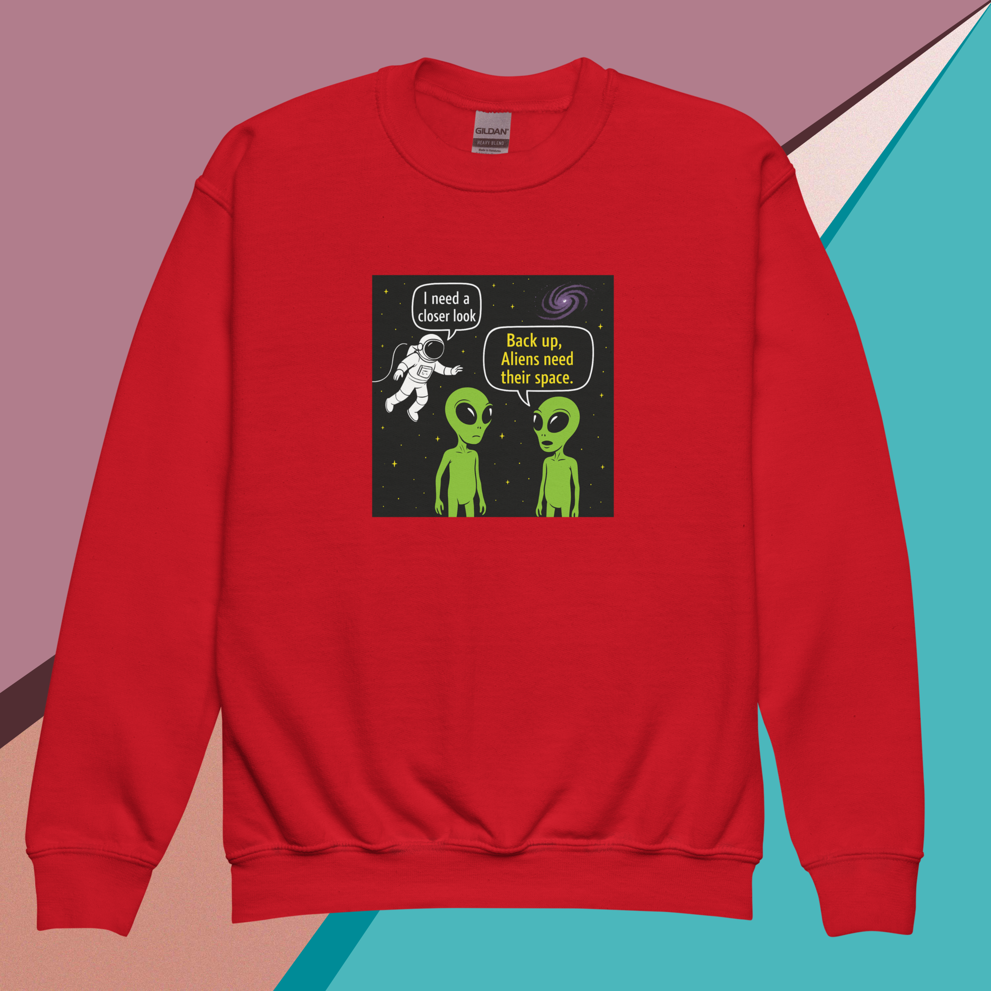 Red sweatshirt with a humorous alien and astronaut cartoon about space and personal space.