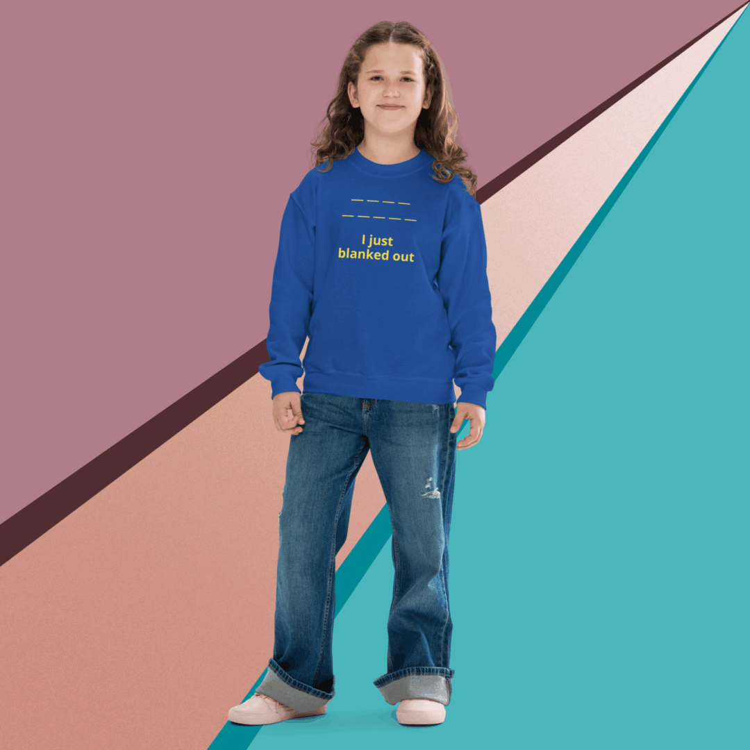 Smiling young girl in a blue hoodie and jeans stands against a colorful geometric background.
