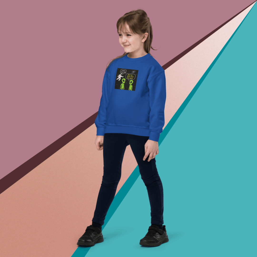 Young woman posing in casual outfit against colorful geometric background.