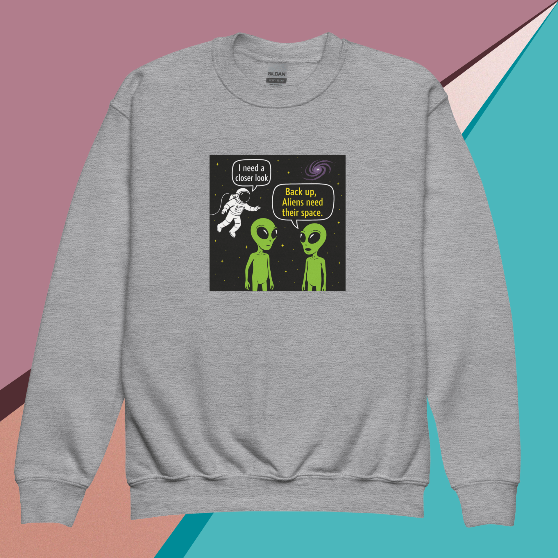 Gray sweatshirt with aliens and astronaut comic design.