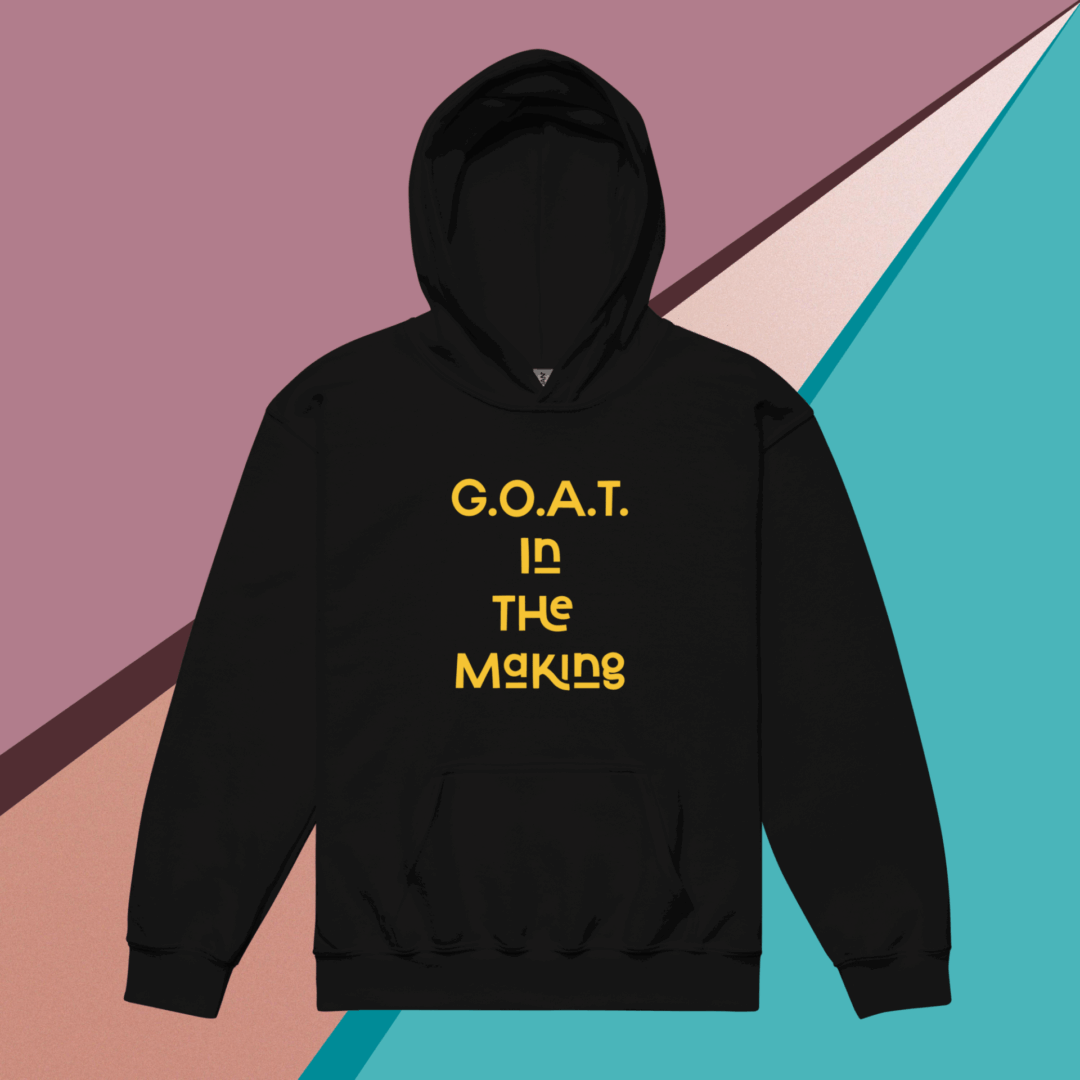 Black hoodie with 'G.O.A.T in the making' text in yellow.
