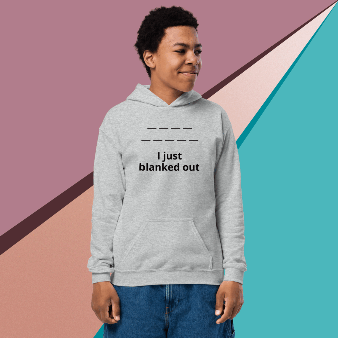 Smiling young man wearing a hoodie with the phrase 'I just blanked out'.