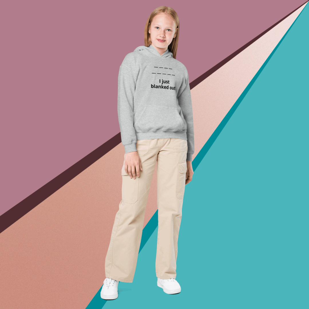 Woman in casual outfit against a colorful geometric background.