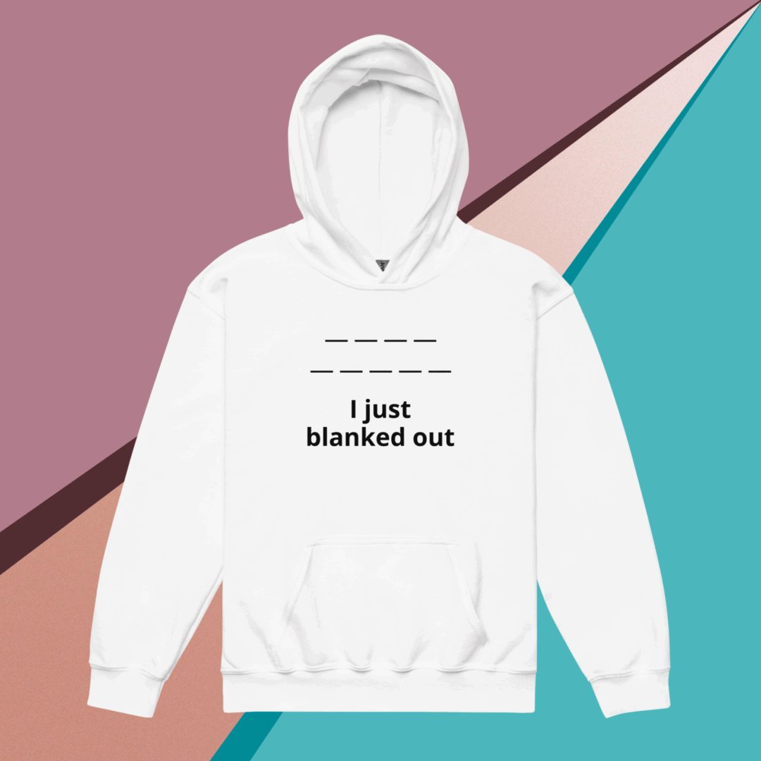 White hoodie with the phrase 'I just blanked out' on a colorful geometric background.