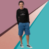 Young man in casual outfit standing confidently against a colorful geometric background.