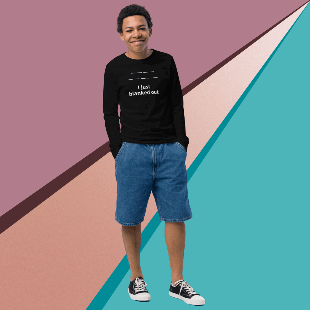 Young man in casual outfit standing confidently against a colorful geometric background.